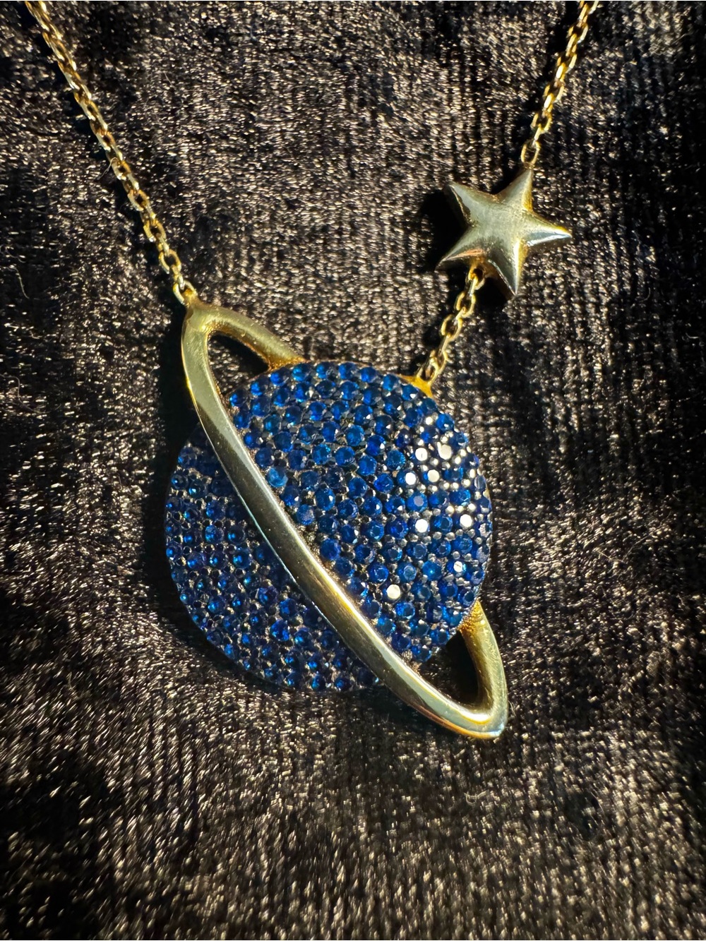 Gold Plated Necklace with Blue Crystal Planet Pendant and Star Accent